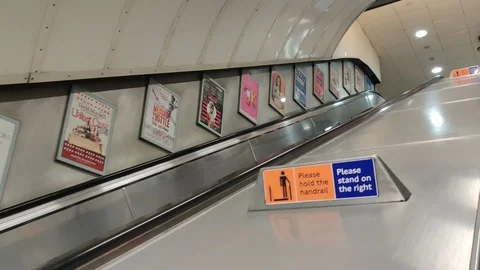 EMPTY OXFORD CIRCUS ESCALATOR DURING COVID-19 LONDON LOCKDOWN, 4K Stock Footage 126433660