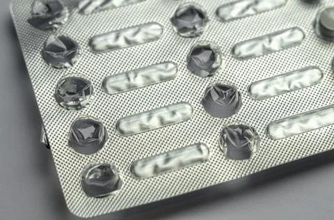 Empty package of flu and cold pills. Used packaging. Stock Photos