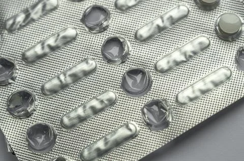 Empty package of flu and cold pills. Used packaging. Stock Photos