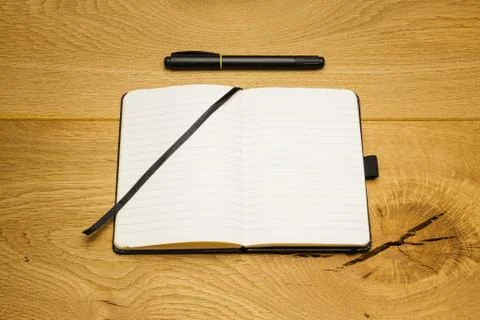 Empty pages notebook marker on desk Stock Photos