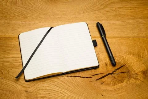 Empty pages notebook marker skew on desk Stock Photos