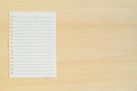 Empty paper note on wood background Stock Photos