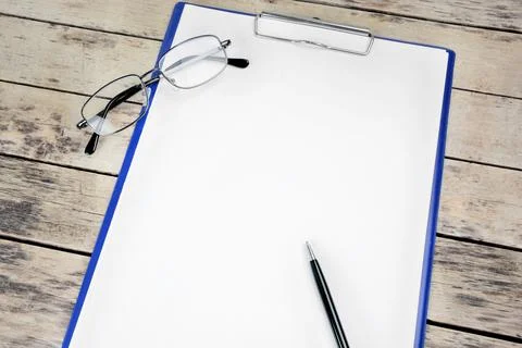 Empty paper sheet with pen container placed on a desk 스톡 사진