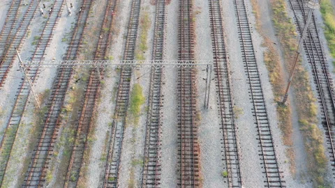 Empty parallel railway tracks in a train station Stock Footage 139018518