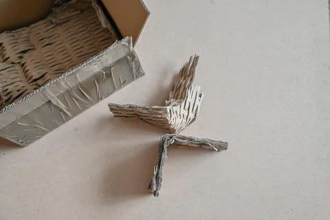 Empty parcel box and protective filler. Eco-friendly Filler made of recycled  Stock Photos