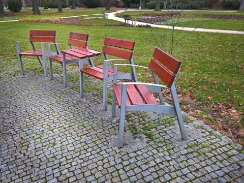 Empty park banches and seats  in November Stock Photos