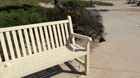 Empty Park Bench pan to Beachfront Stock-Footage 200020582
