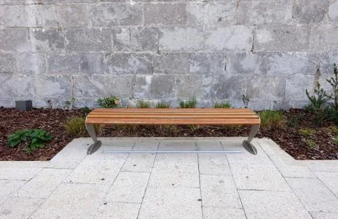 Empty park bench Stock Photos