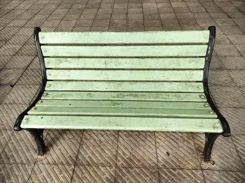 Empty park bench Stock Photos