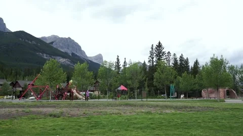 Empty Park with Ha Ling Peak Mountains Stock Footage 144386826