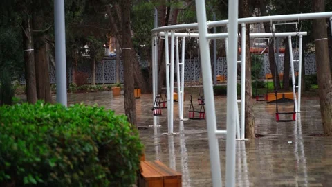 Empty park in the winter bad weather is wet snow Video stock 146650757