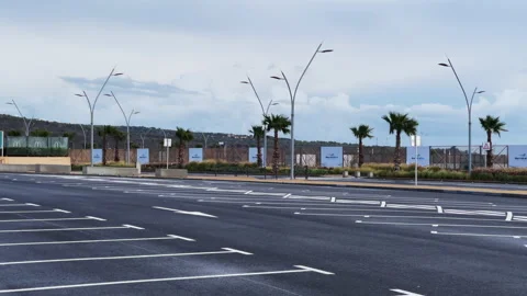 Empty parking lot during the covid-19 pandemic Video stock 183098453