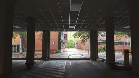 Empty parking lot during rainy afternoon in UCM Campus Stock Footage 168620196