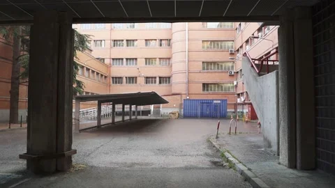 Empty parking lot during rainy afternoon in Universidad Complutense Campus Stock Footage 168620214