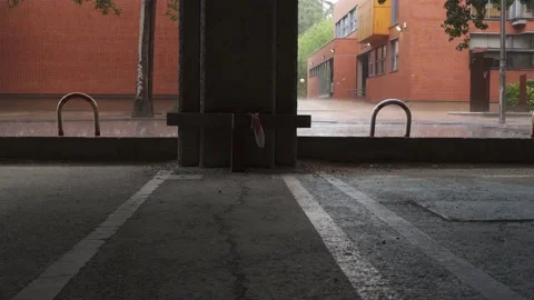 Empty parking lot during rainy afternoon in UCM Campus Stock Footage 168620332