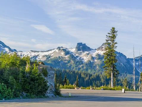 Empty parking lot with snow-capped mountain view in Washington Stock Photos