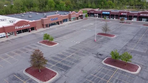 Empty Parking Lots Of Closed Retail Stores Due To Coronavirus Lockdown In Video stock 131081365