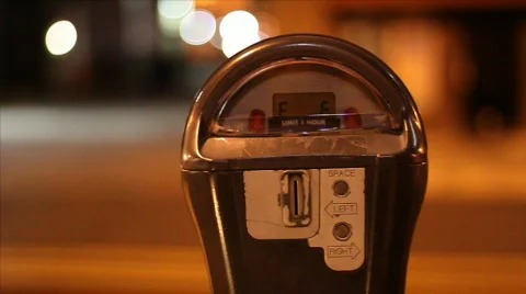 Empty parking meter at night Stock Footage 594894