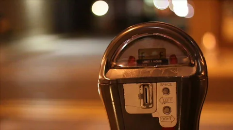 Empty parking meter at night Stock Footage 594915