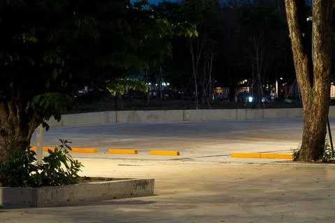 Empty parking space with orange lines on a concrete surface showing a clean.. Stock Photos