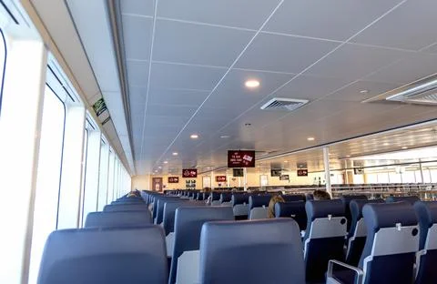 Empty passenger seats inside the ferry Stock Photos