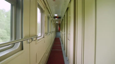 Empty passenger train corridor from inside Stockbeeldmateriaal 197453070