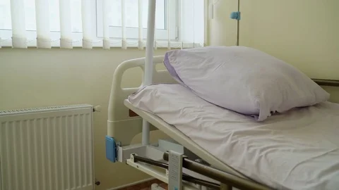 Empty patient room with full electric hospital bed Stock Footage 71010348