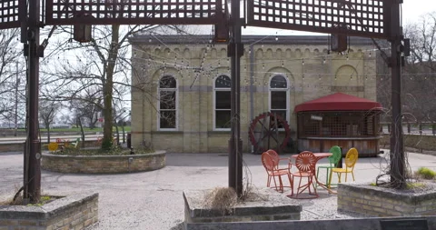 Empty Patio Outside Cafe 4K 23.98 Truck Right to Left and Left to Right Wide Video stock 132822244
