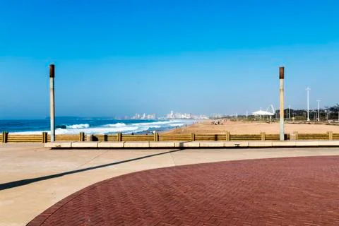 Empty Paved and Patterned Promenade on Beachfront Stock Photos