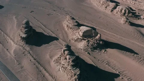 Empty paved road with sandstone formations in desert near alien base, Stock Footage 205260446
