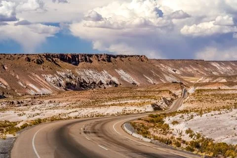 Empty paved road towards Oruro city Stock Photos