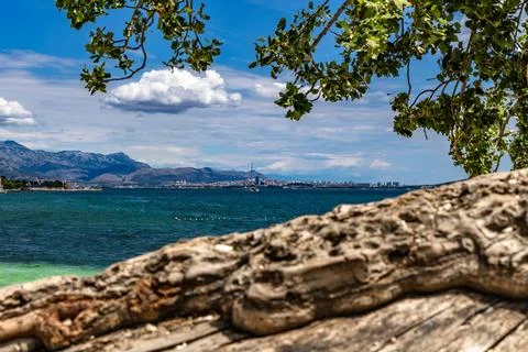 Empty Pebble Beach and Crystal Clear Adriatic Sea Near Kastela Croatia Photos