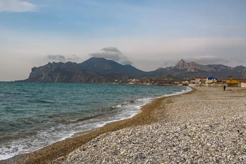 Empty pebble beach in spring. Koktebel. Crimea Stock Photos
