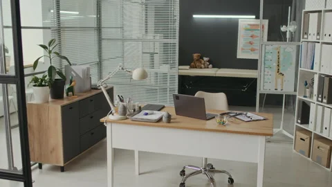 Empty Pediatrician Office Displaying Laptop with Stethoscope Stock Footage 339787102