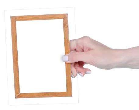 Empty photo frame in hand Stock Photos