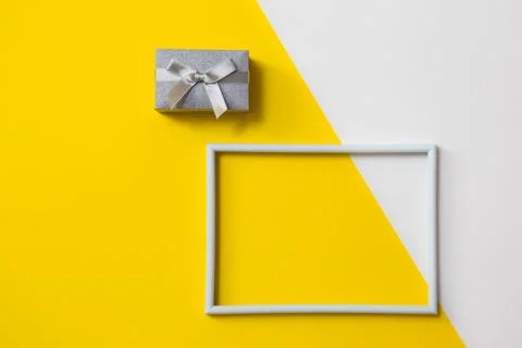 Empty photo frame for text on geometric paper white and yellow colorful Stock-Fotos