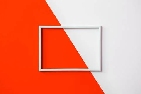 Empty photo frame for text on geometric paper background. Stock-Fotos