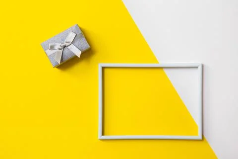 Empty photo frame for text on geometric paper white and yellow colorful Stock-Fotos