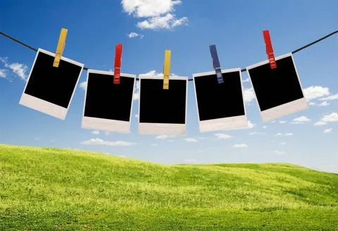 Empty photo frames empty photo frames over sky background ,model released,... Stockfoto's