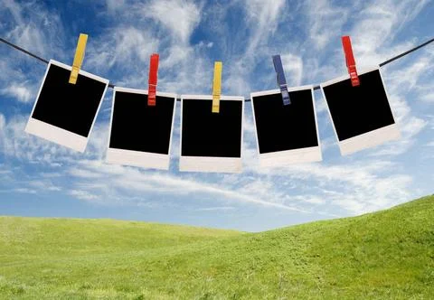 Empty photo frames empty photo frames over sky background ,model released,... Stockfoto's