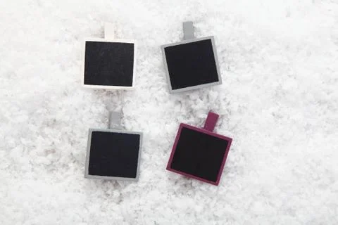 Empty photo frames on snow Stock Photos