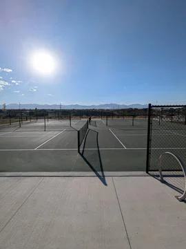 Empty pickleball courts in a park on a bright sunny day 스톡 사진