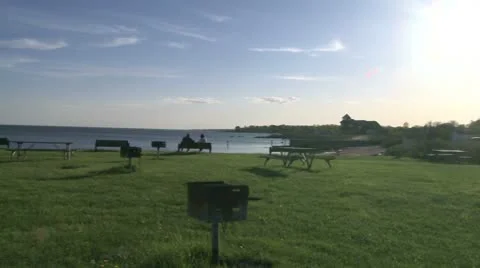 An empty picnic area overlooking the ocean Stock Footage 10775134