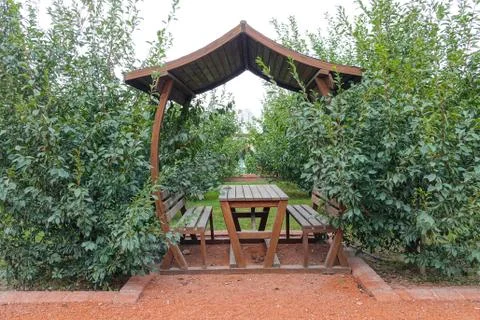 Empty picnic table in the garden Stock Photos