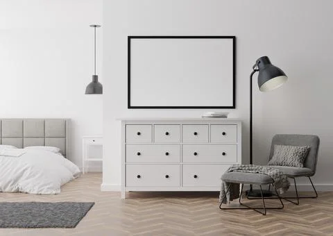 Empty picture frame on white wall in modern bedroom. Mock up interior in cont Stock Photos