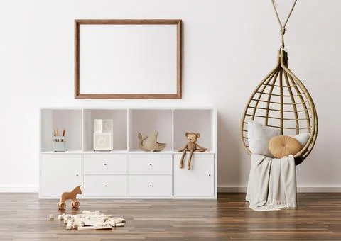 Empty picture frame on white wall in modern child room. Mock up interior in s Stock Photos