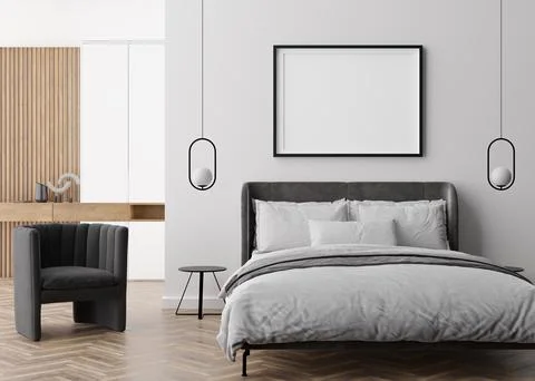 Empty picture frame on white wall in modern bedroom. Mock up interior in cont Stock Photos