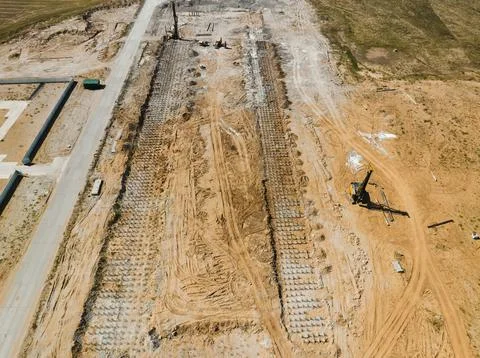 Empty pile field prepared for construction of new mine Stock Photos