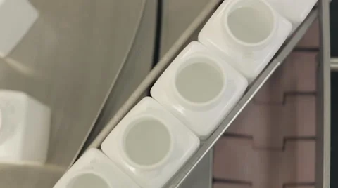 Empty Pill Bottles being Queued for Filling Stock Footage 68642310