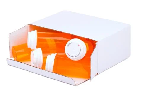 Empty pill bottles in a box Stock Photos